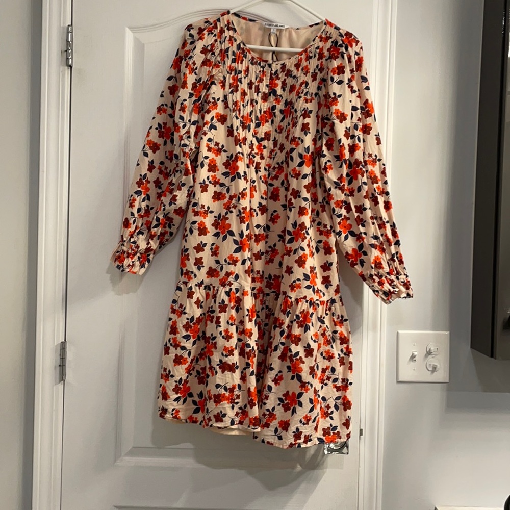Adorable long sleeve midi floral dress.